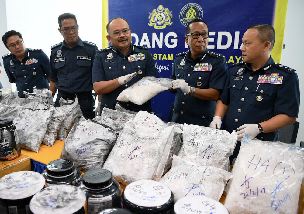 Customs assistant director-general (enforcement) Datuk Abdul Latif Abdul Kadir is pictured with part of the syabu haul during a press conference in Kota Kinabalu March 6, 2019. u00e2u20acu201d Bernama pic