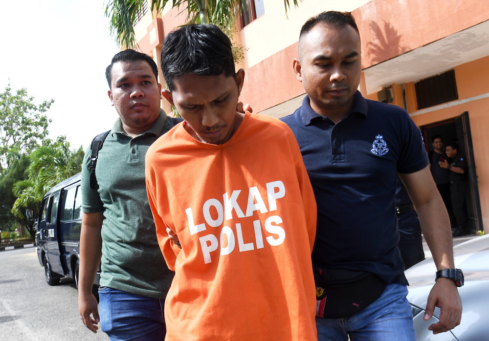 Ramlan Abdul Rashid is brought to the Magistrateu00e2u20acu2122s Court in Langkawi March 20, 2019. u00e2u20acu201d Bernama pic