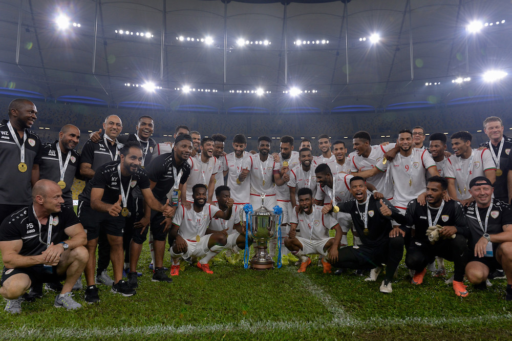 Oman players and staff celebrate clinching the 2019 Airmarine Cup at the National Stadium in Bukit Jalil, Kuala Lumpur March 23, 2019. u00e2u20acu201d Bernama pic