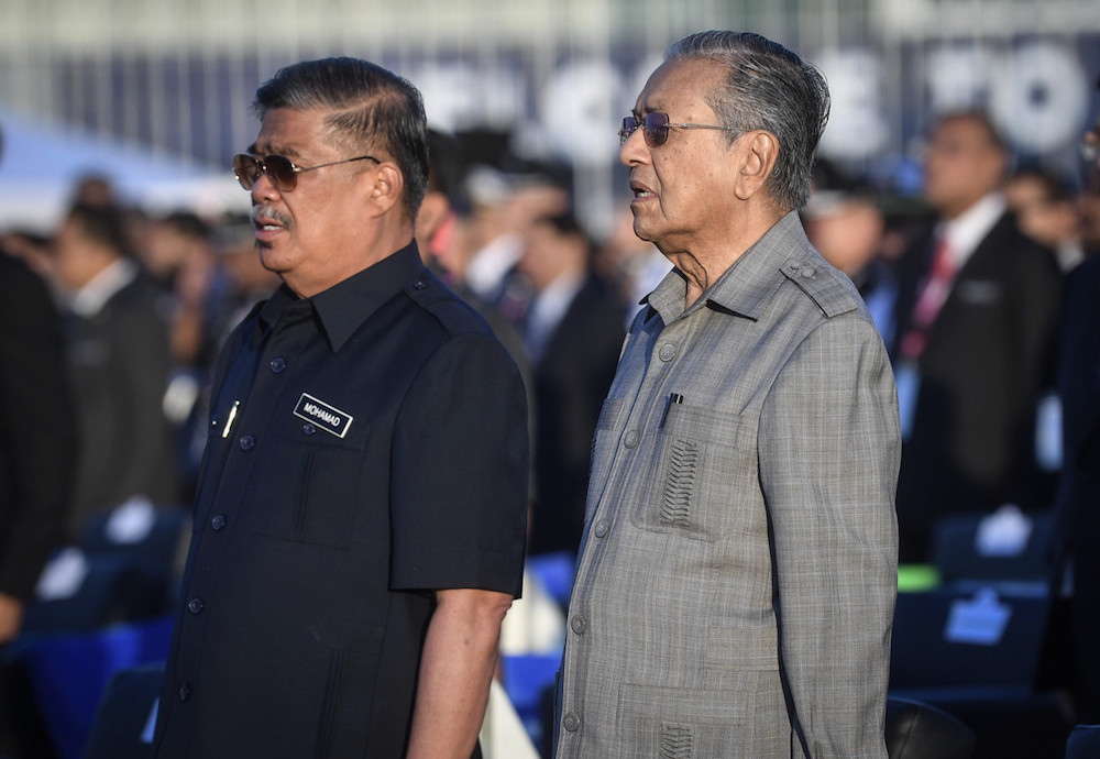 Defence Minister Mohamad Sabu and Prime Minister Tun Dr Mahathir Mohamad attend the opening of the Langkawi International Maritime and Aerospace (LIMA) Exhibition in Langkawi March 26, 2019. u00e2u20acu201d Bernama pic