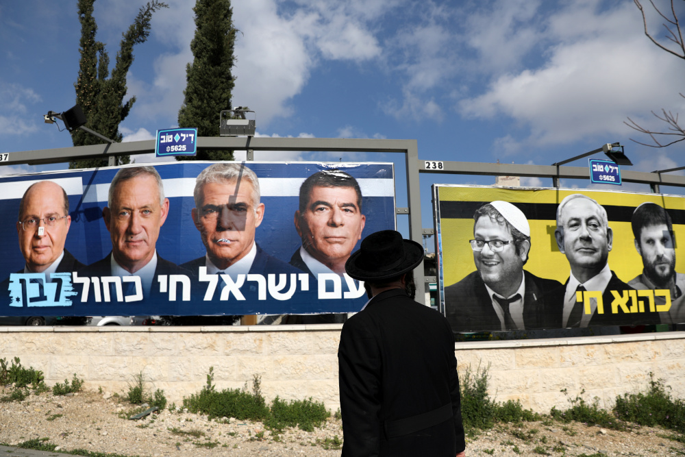 Blue and White party election campaign poster depicting its leaders as well as Israeli Prime Minister Benjamin Netanyahu with members of Israelu00e2u20acu2122s far-right political party, Jewish Power, in Jerusalem March 27, 2019. u00e2u20acu201d Reuters pic  