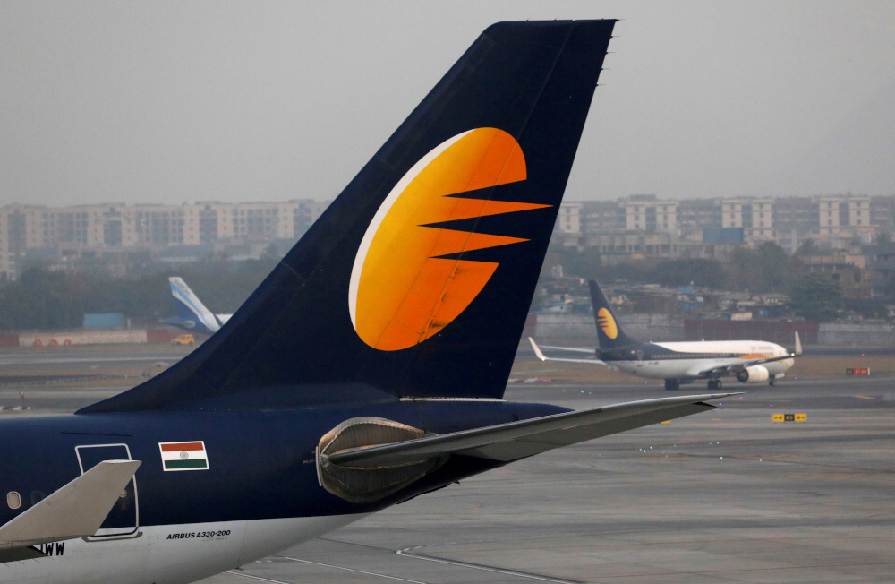 A Jet Airways plane is parked as another moves to the runway at the Chhatrapati Shivaji International airport in Mumbai, India, February 14, 2018. u00e2u20acu201d Reuters pic