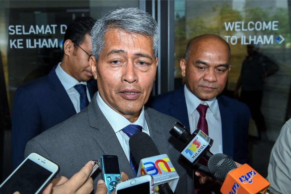 Tenaga Nasional Berhad (TNB) CEO Datuk Seri Azman Mohd speaks to reporters outside the Ilham Tower in Kuala Lumpur July 13, 2018. u00e2u20acu201d Bernama pic
