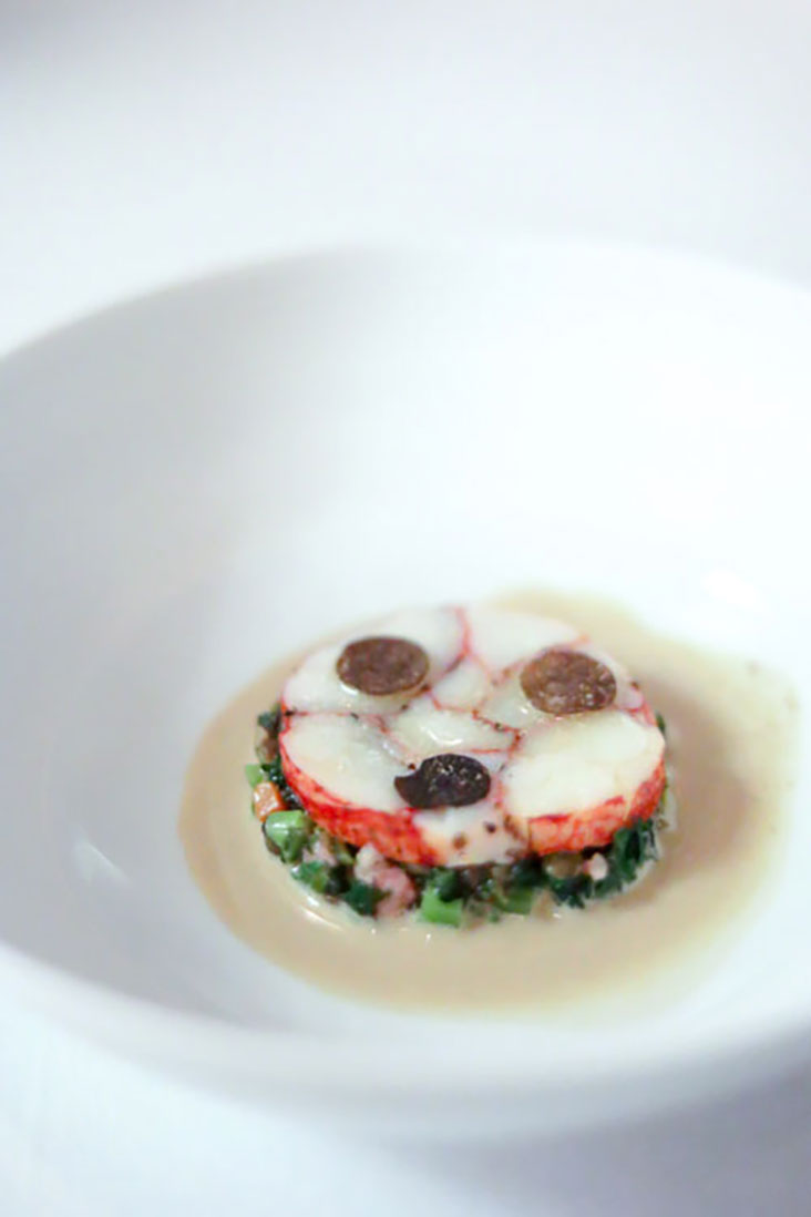 Blue lobster from Brittany with 'shungiku' (spring chrysanthemum), Morteau sausage and green lentils.