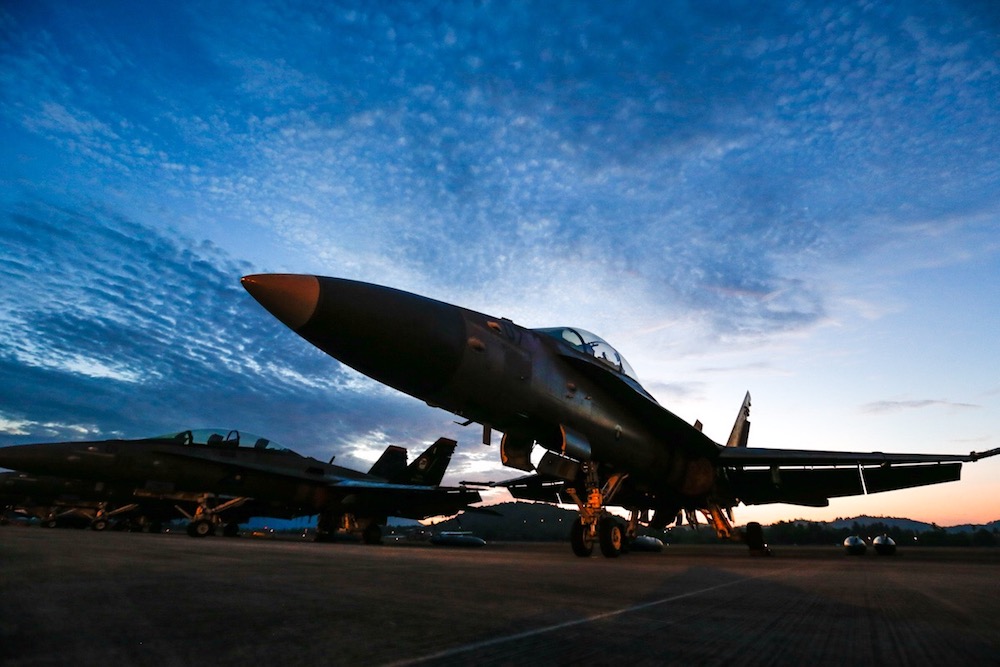 A Royal Malaysian Air Force F/A-18D Hornet is seen during sunrise on the tarmac of Mahsuri International Exhibition Centre during Limau00e2u20acu212219 in Langkawi March 27, 2019. u00e2u20acu201d Picture by Sayuti Zainudin