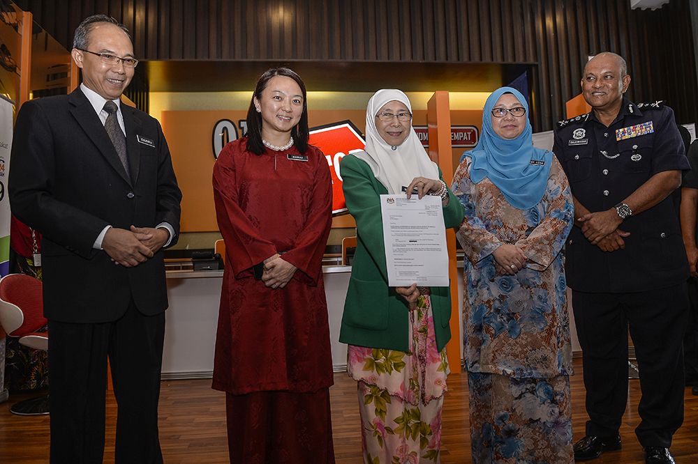 Minister of Woman, Family and Community Development Datuk Seri Dr Wan Azizah Wan Ismail (centre) launches the child sex offenders registry in Putrajaya March 26, 2019. u00e2u20acu201d Picture by Miera Zulyana