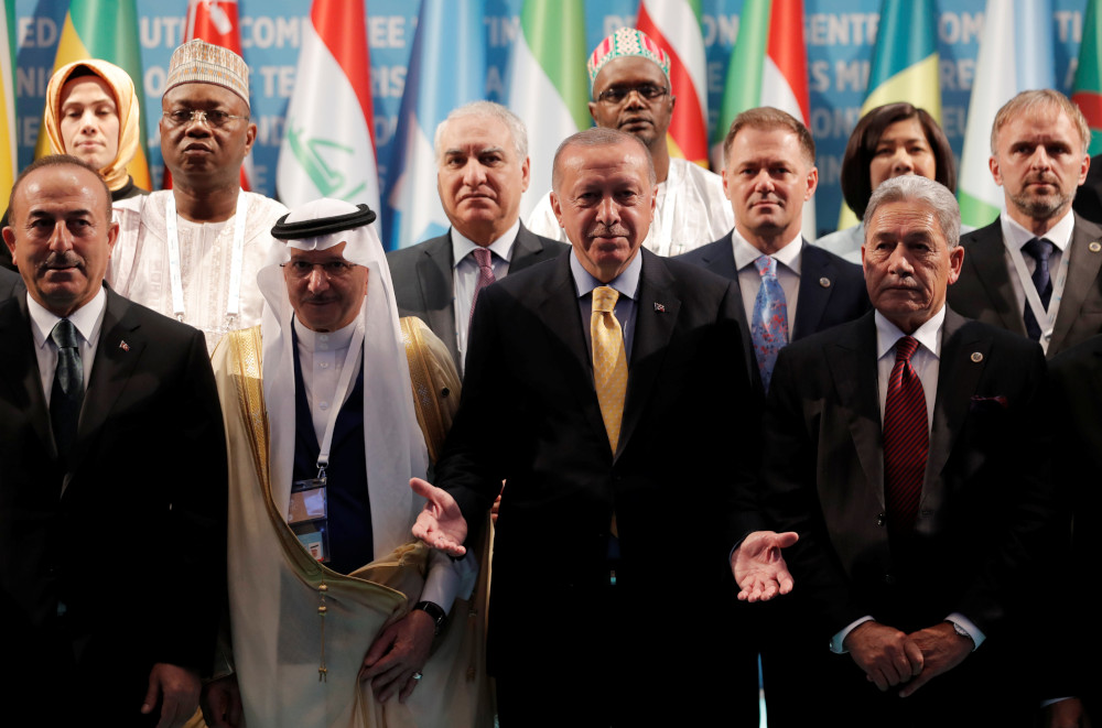 Turkish President Recep Tayyip Erdogan with New Zealandu00e2u20acu2122s Foreign Minister Winston Peters and Turkish Foreign Minister Mevlut Cavusoglu during an OIC meeting in Istanbul, Turkey, March 22, 2019. u00e2u20acu201d Reuters pic 