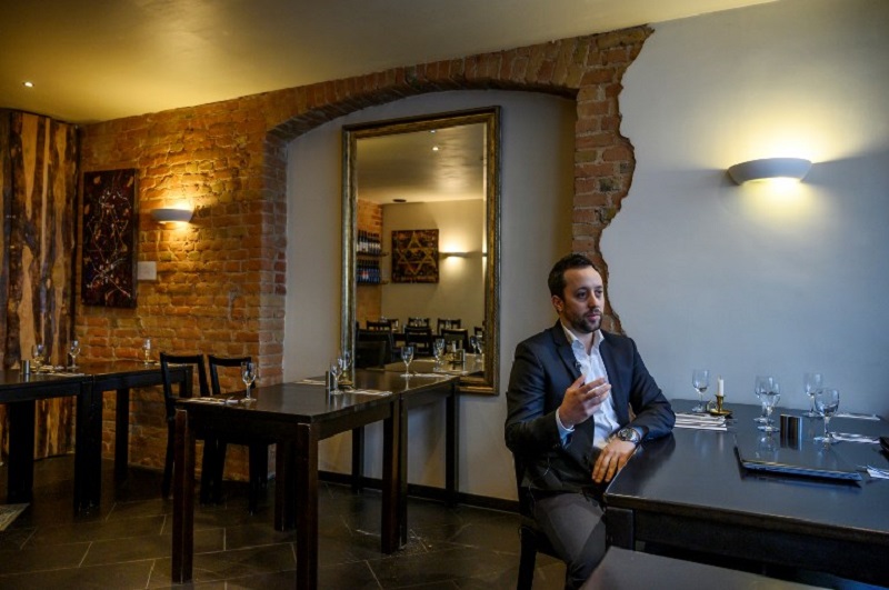 Israeli restaurateur Yorai Feinberg answers AFP journalists' questions during an interview on February 26, 2019 at his restaurant in Berlin. u00e2u20acu201d AFP pic