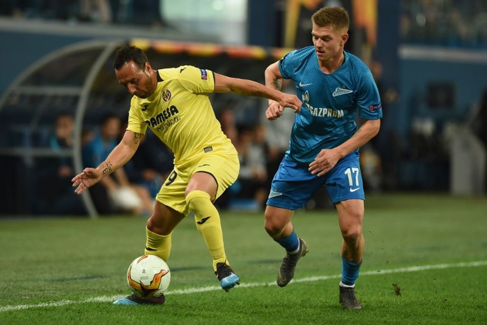 Villarrealu00e2u20acu2122s forward Carlos Bacca and Zenit St Petersburgu00e2u20acu2122s midfielder Oleg Shatov vie for the ball during their Europa League round of 16 first leg match in Saint Petersburg on March 7, 2019. u00e2u20acu201d AFP pic