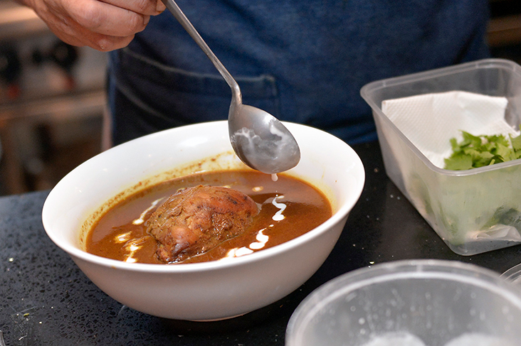 The thick curry broth is packed with spices brought in from Chiang Mai and takes up to two days to make.