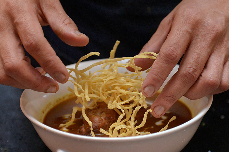 You have egg noodles in the bowl and the fried variety topping the 'khao soi'.