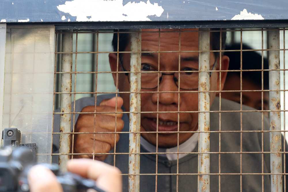 Aye Maung, Ann Township MP and former Arakan National Party leader, speaks to the media as he is escorted out of court after his hearing in Sittwe, Rakhine March 19, 2019. u00e2u20acu201d AFP pic
