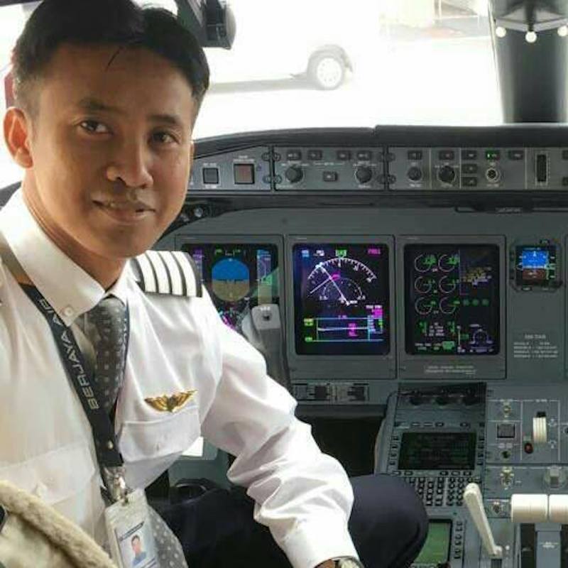 Capt Muhammad Fauwaz Zamzam is seated in the cockpit of a private jet in this undated picture taken from his personal Facebook page.