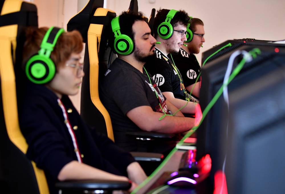 Gamers, members of the eSports outfit Team Vitality, play video games in the training room on January 16, 2019 at a 'gaming house' in Halensee, a Berlin suburb. u00e2u20acu201d AFP pic