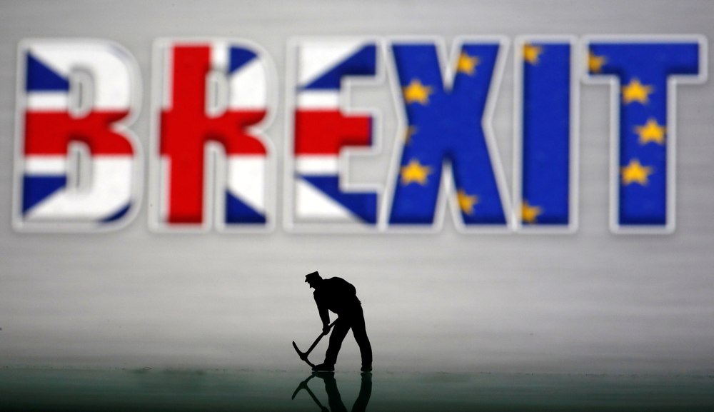A small toy figure is seen in front of a Brexit logo in this illustration picture, March 30, 2019. u00e2u20acu201d Reuters pic