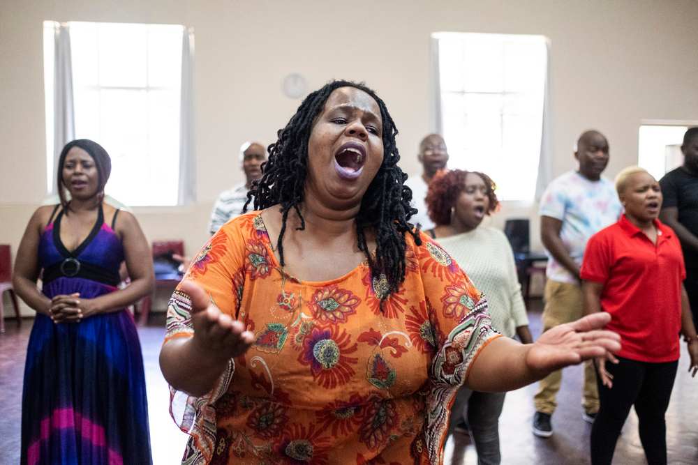 Duduzile Ngomane, a member of The Soweto Gospel Choir, sings during a rehearsal at the Scout's Hall in Rosebank, Johannesburg February 21, 2019. u00e2u20acu201d AFP pic