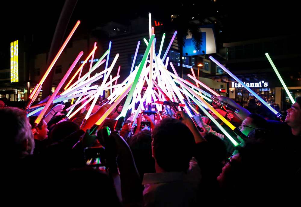 Star Wars enthusiasts huddle with their lightsabers after participating in Earth Hour at Taguig City, Philippines March 30, 2019. u00e2u20acu201d Reuters pic