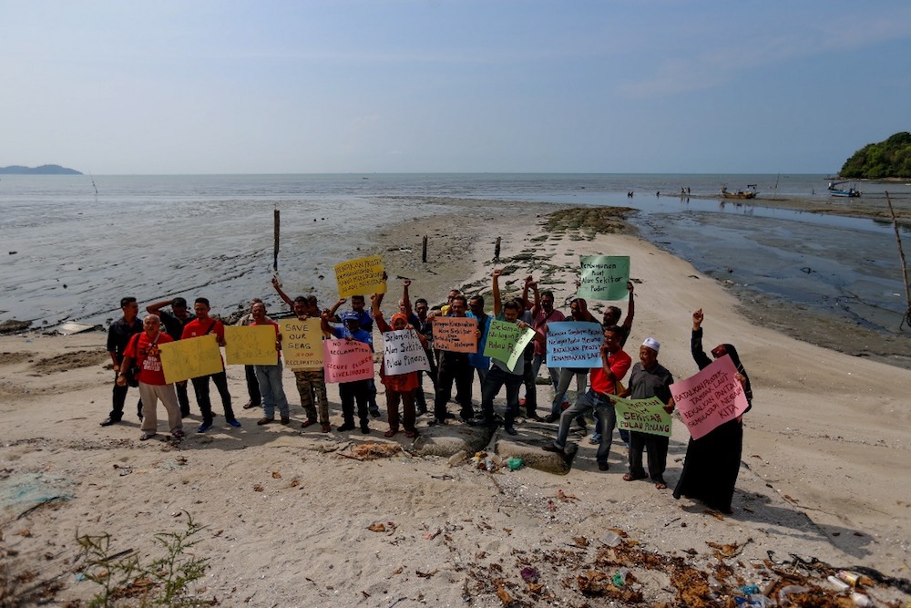 A group of fishermen hold a peaceful demonstration to oppose the Penang South Reclamation project at Teluk Kumbar March 13, 2019. u00e2u20acu201d Picture by Sayuti Zainudin