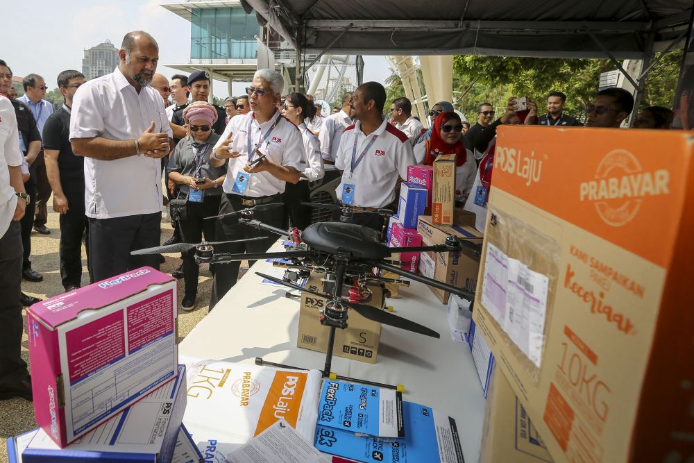 Communications and Multimedia Minister Gobind Singh Deo visits the drone exhibition during the Parcel Drone Competition in Putrajaya March 7, 2019. u00e2u20acu2022 Picture by Yusof Mat Isa