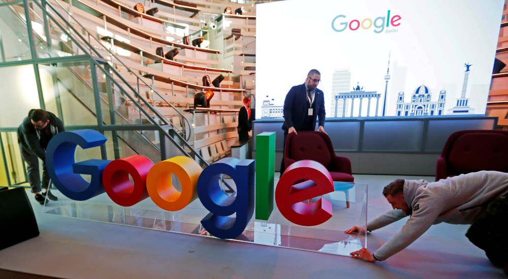 Workers move a Google logo during the opening of the new Alphabetu00e2u20acu2122s Google Berlin office in Berlin, Germany, January 22, 2019. u00e2u20acu201d Reuters pic 