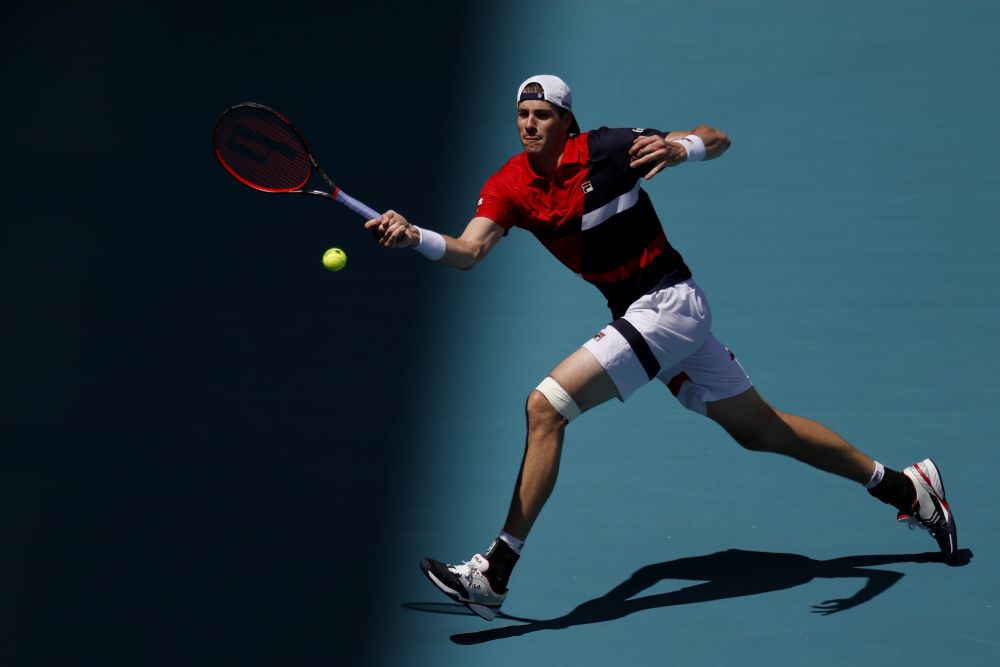 John Isner hits a forehand against Kyle Edmund in the fourth round of the Miami Open at Miami Open Tennis Complex.u00e2u20acu201d Reuters pic