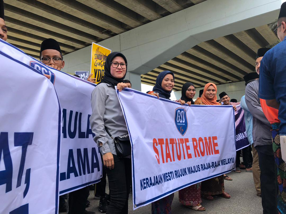 Protesters stating their stand against the governmentu00e2u20acu2122s decision to accede the Rome Statute near the Istana Pasir Pelangi entrance in Johor Baru March 22, 2019. u00e2u20acu201d Picture courtesy of the Kulai Youth Council