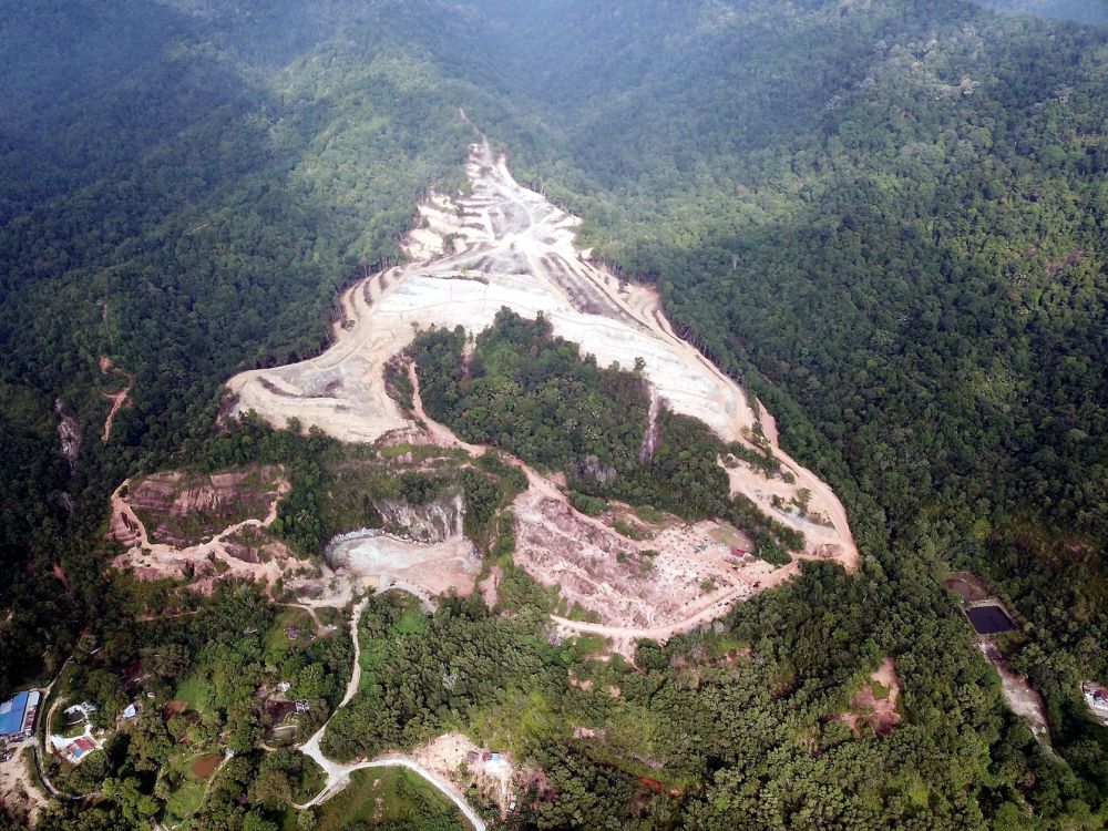 An aerial view of the illegal land clearing site at Kledang Hill.