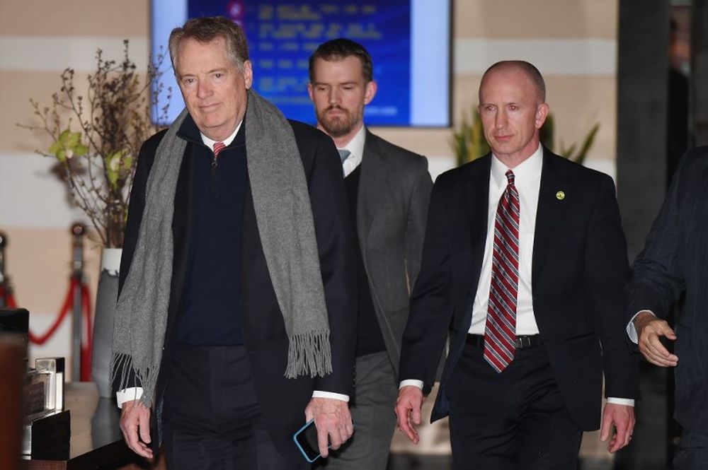 US Trade Representative Robert Lighthizer (left) and Deputy Trade Representative Jeffrey Gerrish (right) leave a hotel in Beijing on March 28, 2019. u00e2u20acu201d AFP pic