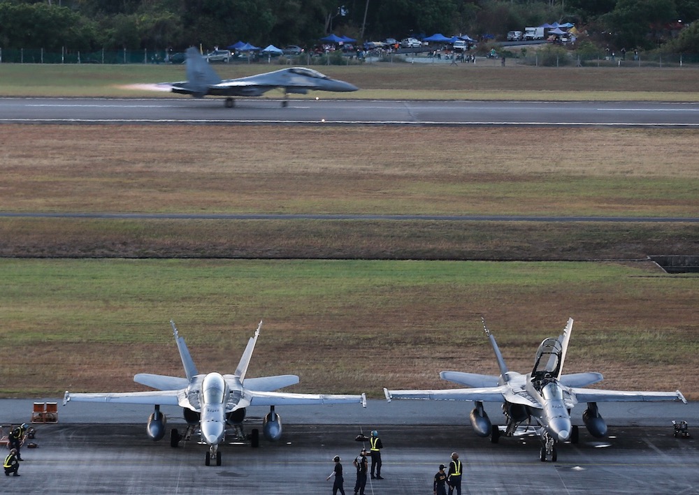 A Sukhoi Su-30MKM fighter jet takes off before the start of the Langkawi International Maritime and Aerospace (LIMA) Exhibition opening ceremony at Mahsuri International Exhibition Centre, Langkawi March 26, 2019. — Picture by Sayuti Zainudin