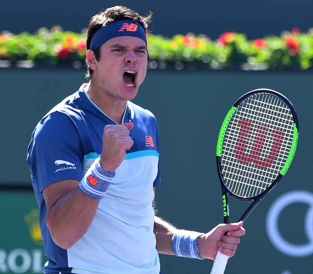 Milos Raonic celebrates match point as he won his quarterfinal match against Miomir Kecmanovic (not pictured) in the BNP Paribas Open at the Indian Wells Tennis Garden. u00e2u20acu2022 Picture by Jayne Kamin-Oncea-USA TODAY Sports via Reuters
