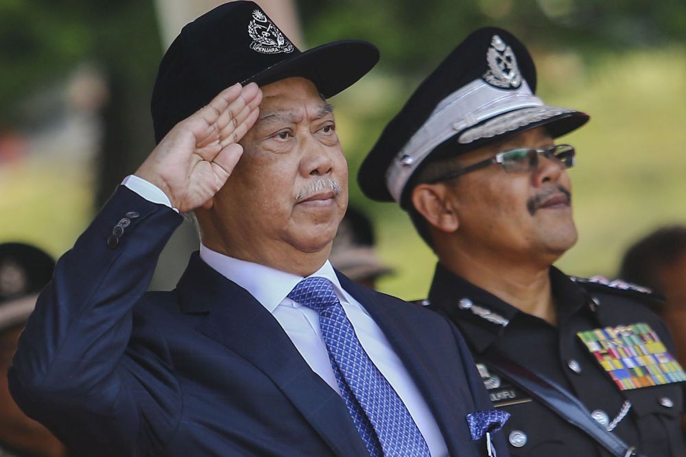 Home Minister Tan Sri Muhyiddin salutes the guard of honour at the Prisons Academy in Kajang March 20, 2019. u00e2u20acu201d Picture by Hari Anggara