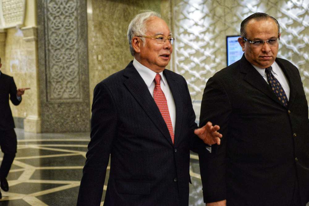 Datuk Seri Najib Razak arrives at the Court of Appeal in Putrajaya March 12, 2019. u00e2u20acu201d Picture by Shafwan Zaidon