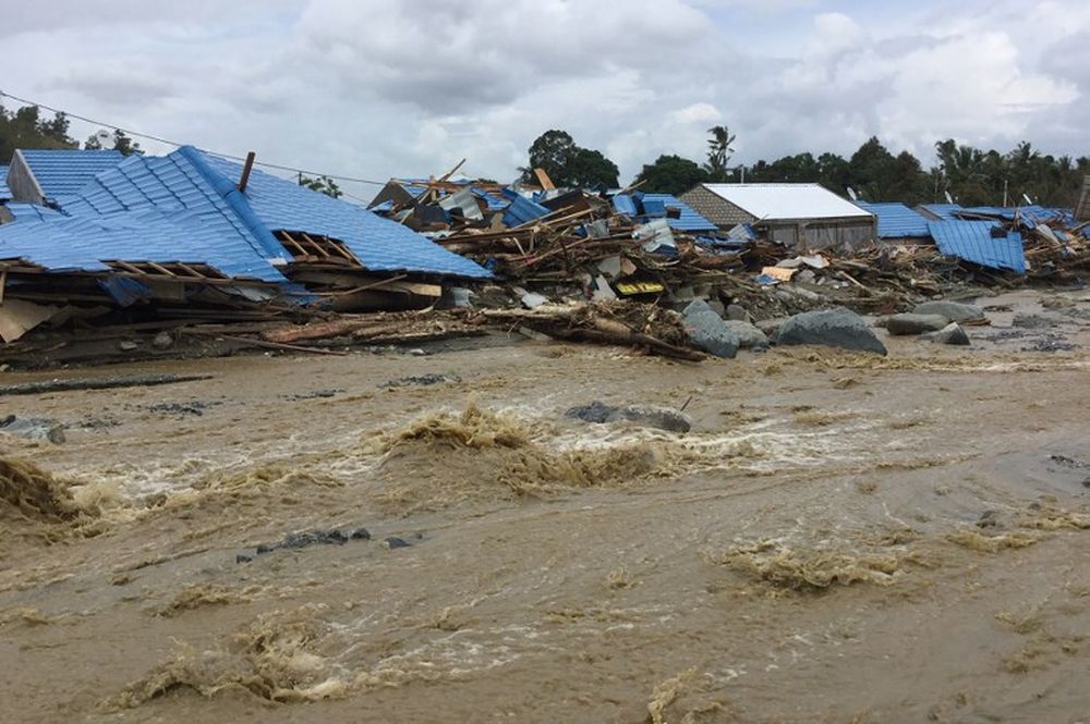 Collapsed houses caused by flash floods are seen in Sentani near the provincial capital of Jayapura, Indonesiau00e2u20acu2122s eastern Papua province, on March 17, 2019. u00e2u20acu201d AFP pic