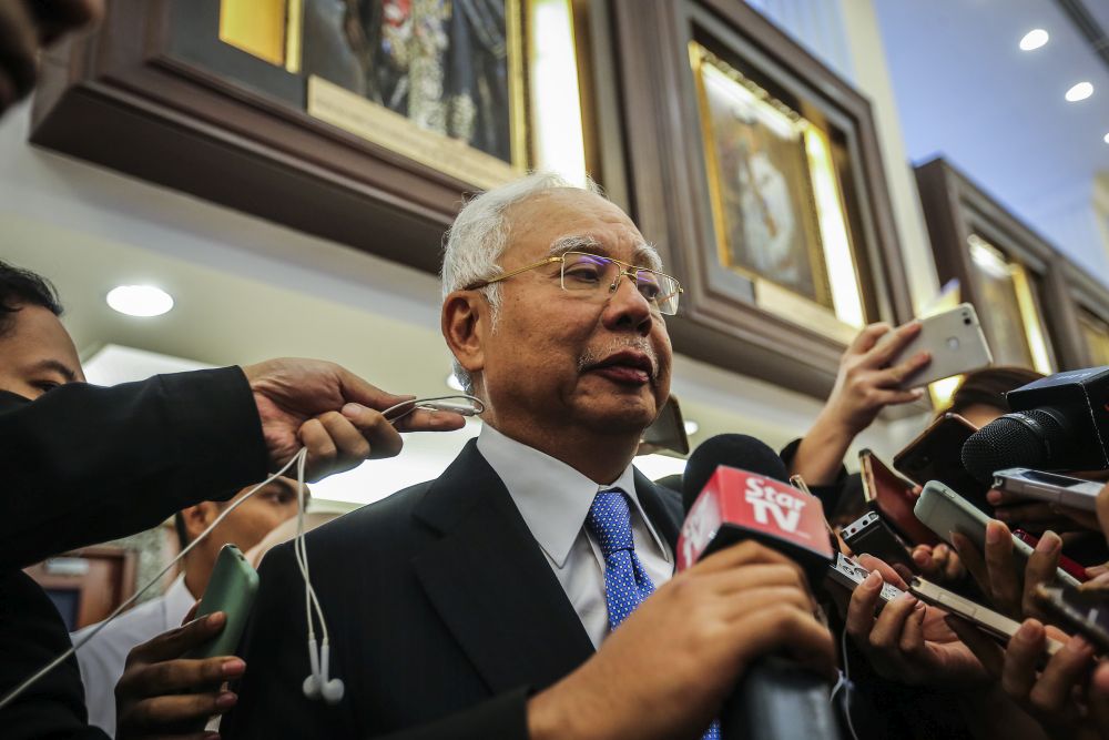 Datuk Seri Najib Razak speaks to reporters at Parliament in Kuala Lumpur March 25, 2019. u00e2u20acu201d Picture by Firdaus Latif
