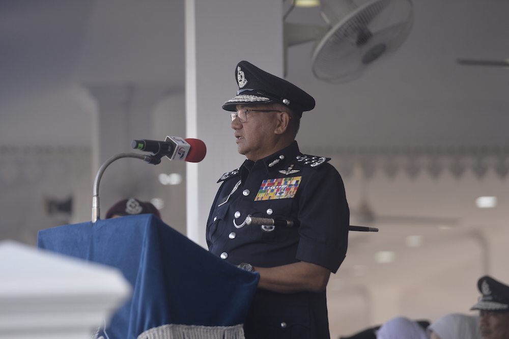Inspector-General of Police Tan Sri Mohamad Fuzi Harun addresses the 212th Police Day Parade at the Police Training Centre (Pulapol) in Kuala Lumpur March 25, 2019. u00e2u20acu201d Picture by Miera Zulyana
