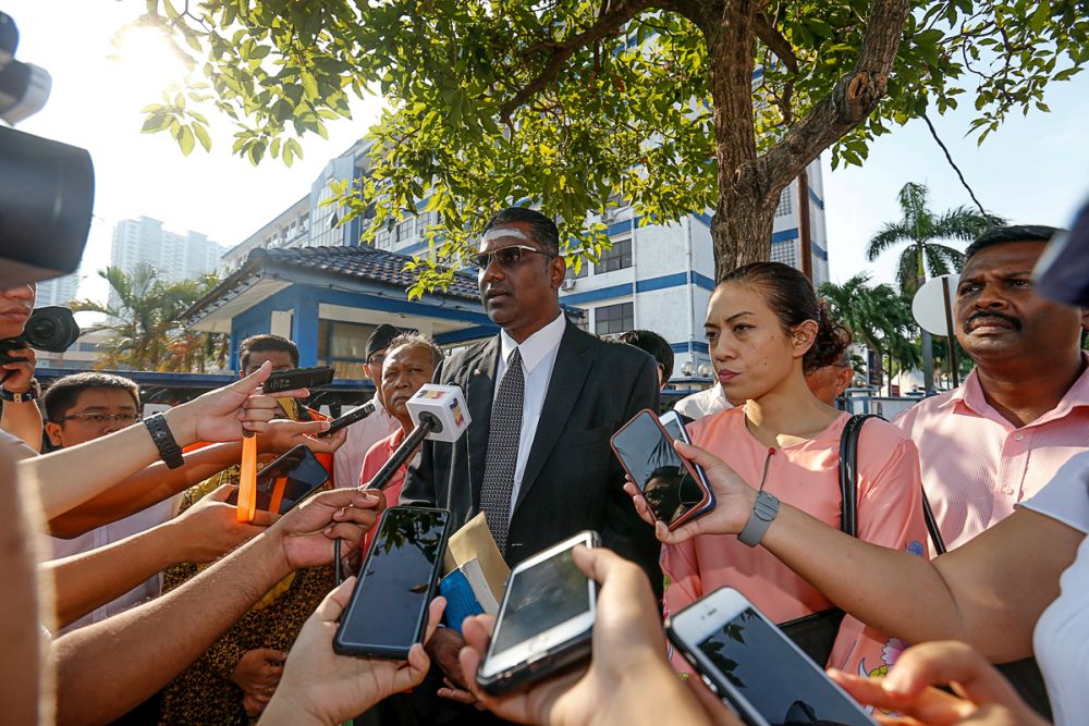 Jelutong MP RSN Rayer speaks to media personnel outside the northeast district police headquarters in George Town March 15, 2019. u00e2u20acu201d Picture by Sayuti Zainudin