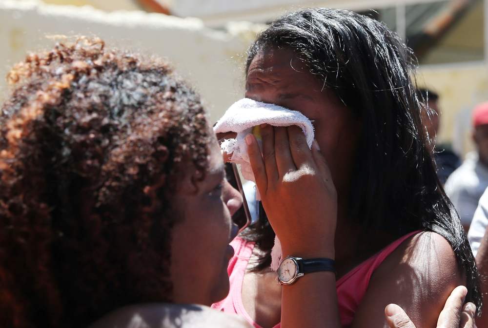Relatives of students are seen in front of the Raul Brasil school after a shooting in Suzano, Sao Paulo, Brazil March 13, 2019. u00e2u20acu201d Reuters pic