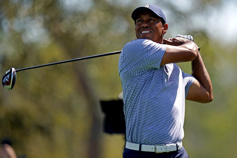 Tiger Woods plays his shot from the ninth tee during the second round of The Players Championship golf tournament at TPC Sawgrass u00e2u20acu2022 Stadium Course in Florida. u00e2u20acu2022 Picture by Jasen Vinlove-USA TODAY Sports via Reuters