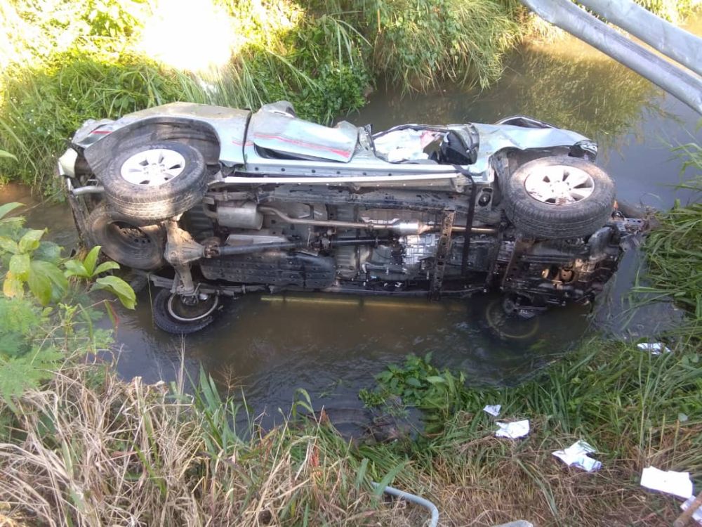 The Toyota Hilux driven by the victim landed in the drain at Jalan Lahat-Simpang Pulai near the Stone Link Factory here. u00e2u20acu201d Picture courtesy of PDRM