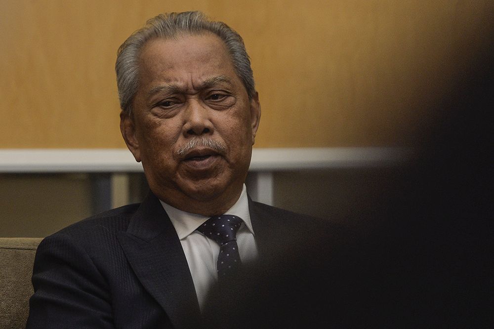Minister of Home Affairs Tan Sri Muhyiddin Yassin speaks to reporters in Putrajaya after naming the royal inquiry panel which will probe the mass graves and human trafficking in Wang Kelian on March 5, 2019. u00e2u20acu201d Picture by Miera Zulyana