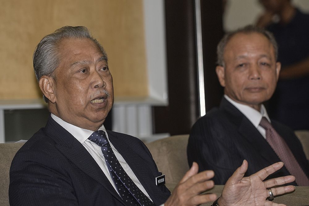 Minister of Home Affairs Tan Sri Muhyiddin Yassin speaks to reporters in Putrajaya after naming the royal inquiry panel which will probe the mass graves and human trafficking in Wang Kelian on March 5, 2019. u00e2u20acu201d Picture by Miera Zulyana