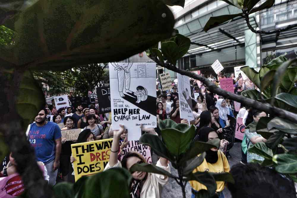 Demonstrators take part in a march in conjunction with International Women's Day in Kuala Lumpur March 9, 2018. ― Picture by Shafwan Zaidon