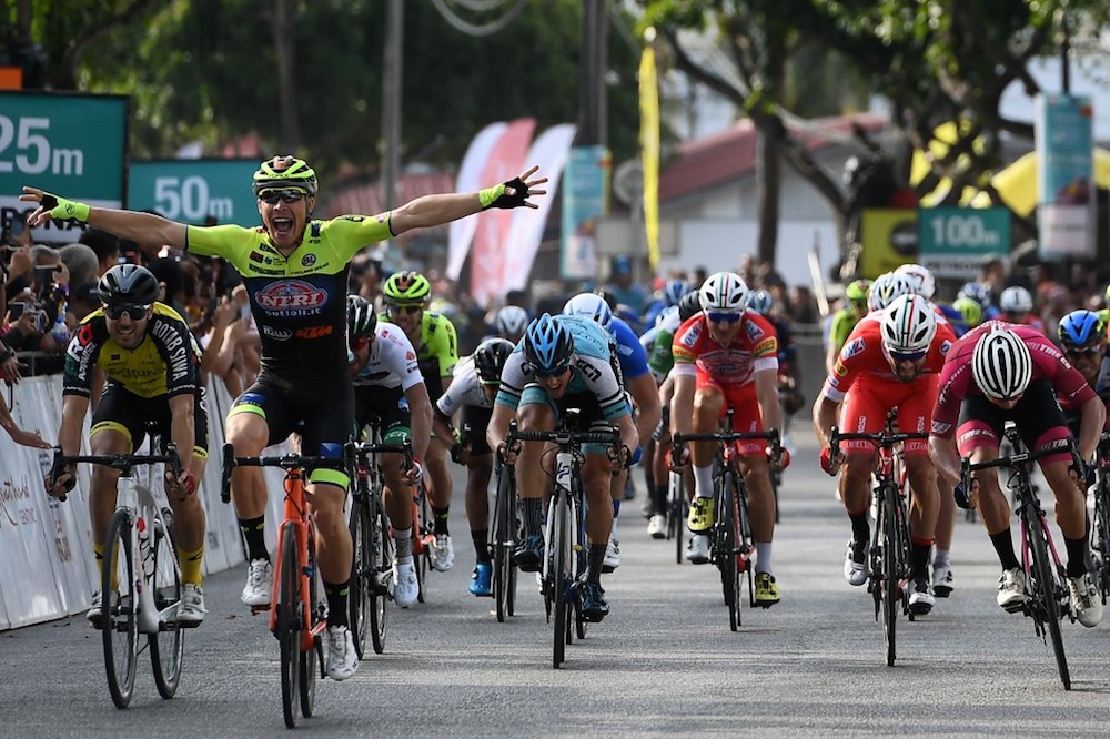 Neri Sottoli-Selle Italia-KTMu00e2u20acu2122s Simone Bevilacqua of Italy (front left) reacts as he crosses the finish line to win the seventh stage of the Le Tour de Langkawi from Pantai Cenang to Pantai Cenang in Langkawi April 12, 2019. u00e2u20acu201d AFP pic
