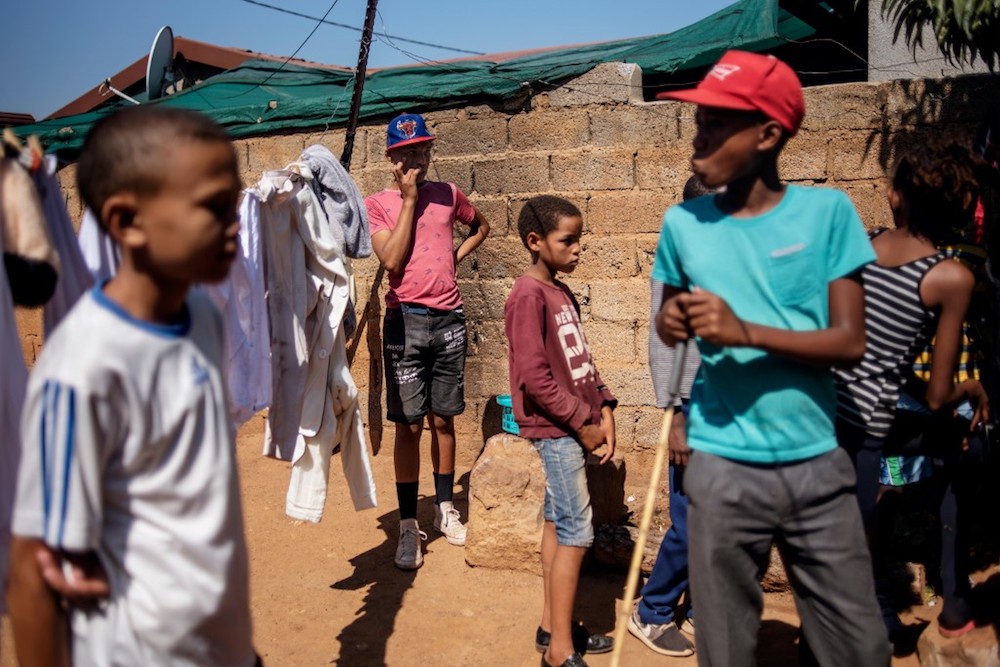 Children play in the yard of a dwelling in the coloured community of Eldorado Park on the outskirts of Johannesburg April 18, 2019. u00e2u20acu201d AFP pic