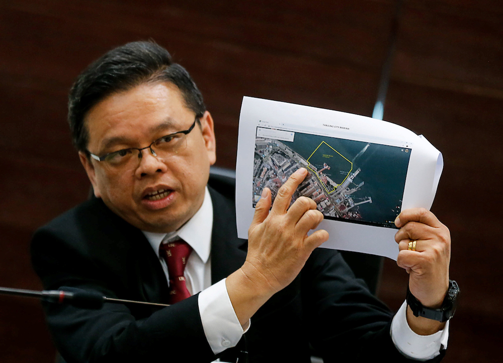 Penang Port Commission Chairman Jeffrey Chew shows the location of the PPC-owned land during a press conference at the Penang Port Commmission office, April 1, 2019. — Picture by Sayuti Zainudin