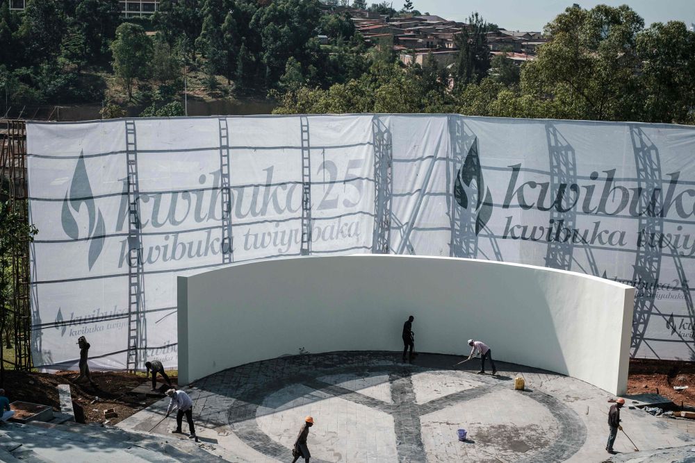 Workers clean the stage at the Genocide Memorial in Kigali, ahead of the 25th commemoration of the 1994 Genocide against the Tutsi, April 6, 2019. u00e2u20acu201d AFP pic