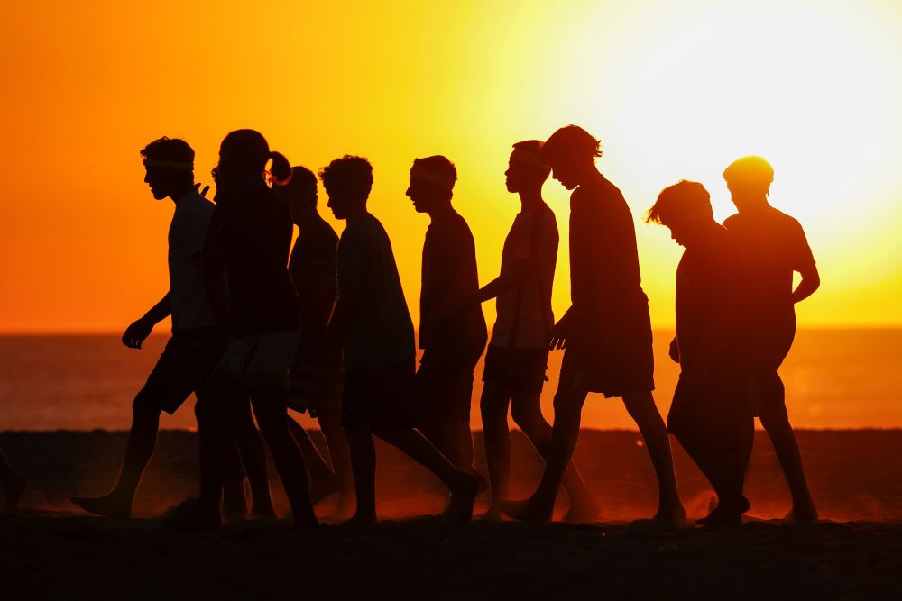 A group of boys walk at Moonlight beach in Encinitas, California, US October 16, 2018. A study has found that boys whose mothers did not have a college degree were more likely to report having had sexual intercourse before the age of 13. u00e2u20acu201d Reuters pic