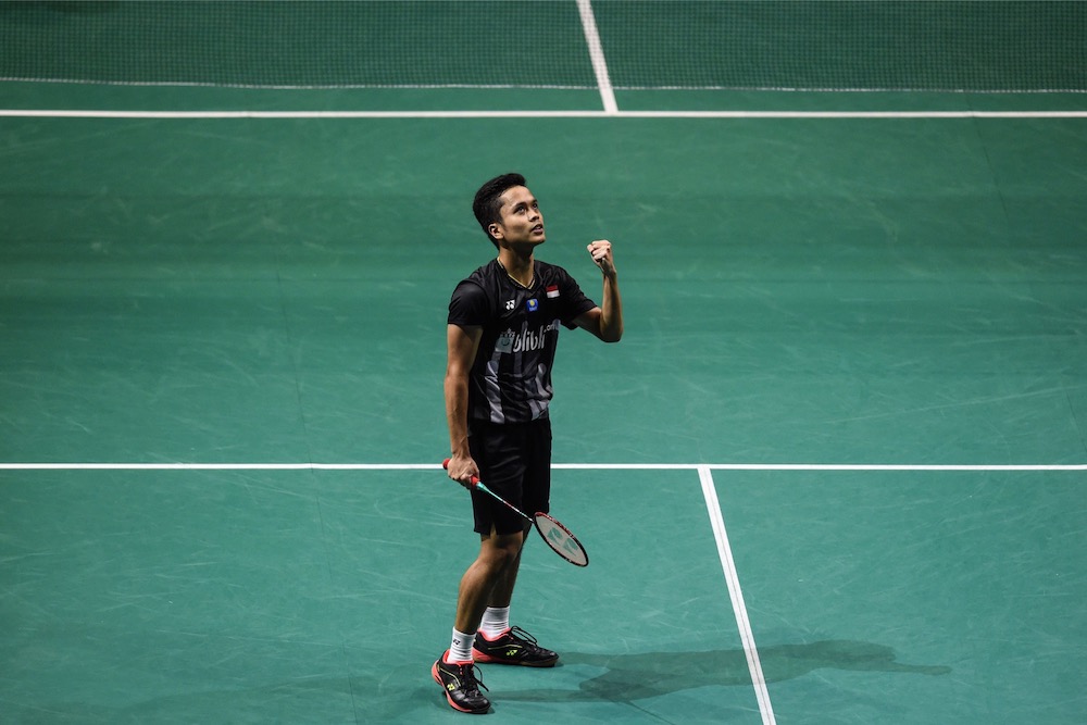Indonesia's Anthony Sinisuka Ginting reacts after a point against China's Chen Long during their men's singles match at the Singapore Open badminton tournament in Singapore April 12, 2019. u00e2u20acu201d AFP pic