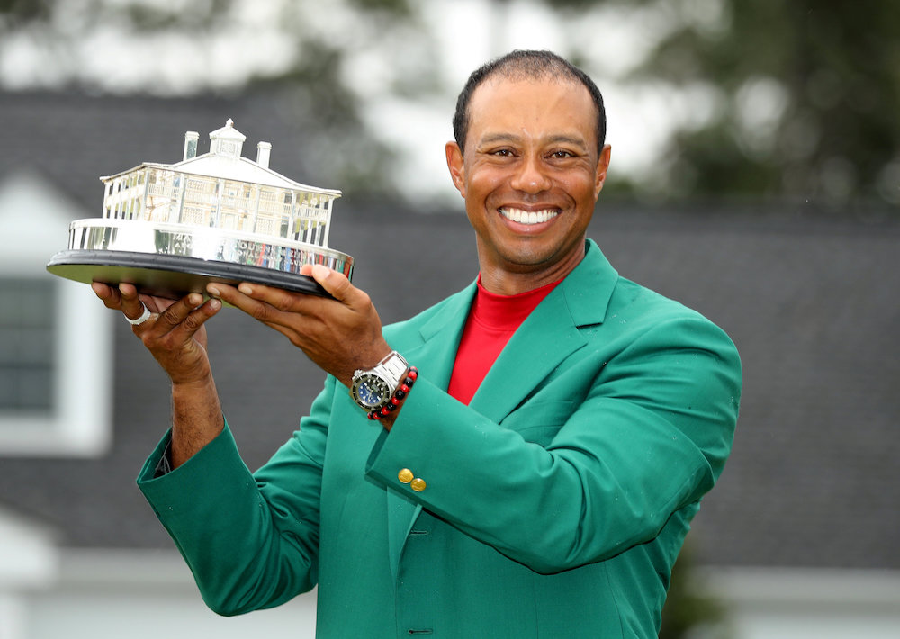 Tiger Woods of the US celebrates with his green jacket and trophy after winning the 2019 Masters in Augusta April 14, 2019. u00e2u20acu201d Reuters pic