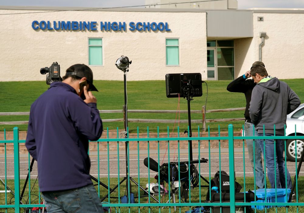 Members of the media gather outside Columbine High School as some Denver area schools closed while police searched for an armed woman u00e2u20acu02dcinfatuatedu00e2u20acu2122 with the Columbine massacre, in Littleton, Colorado, April 17, 2019. u00e2u20acu201d Reuters picn